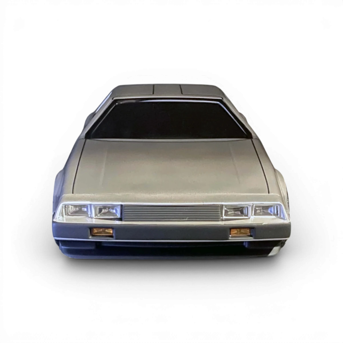 Carrosserie DMC Delorean pour voiture RC Aplastics RC, modèle détaillé en plastique avec finition précise.