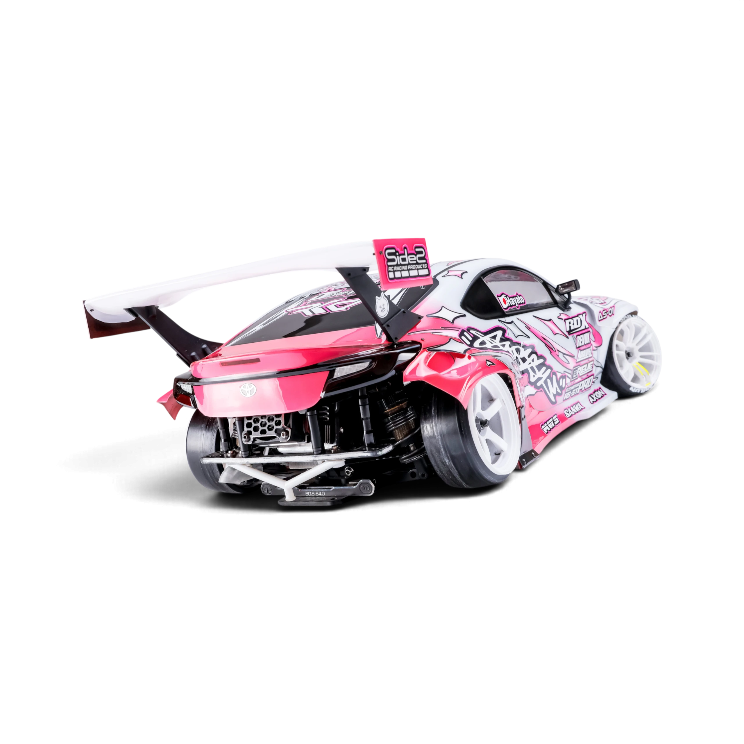 Aileron DriftParadiZ 8810 Style en polycarbonate blanc monté sur une voiture RC de drift rose et blanche