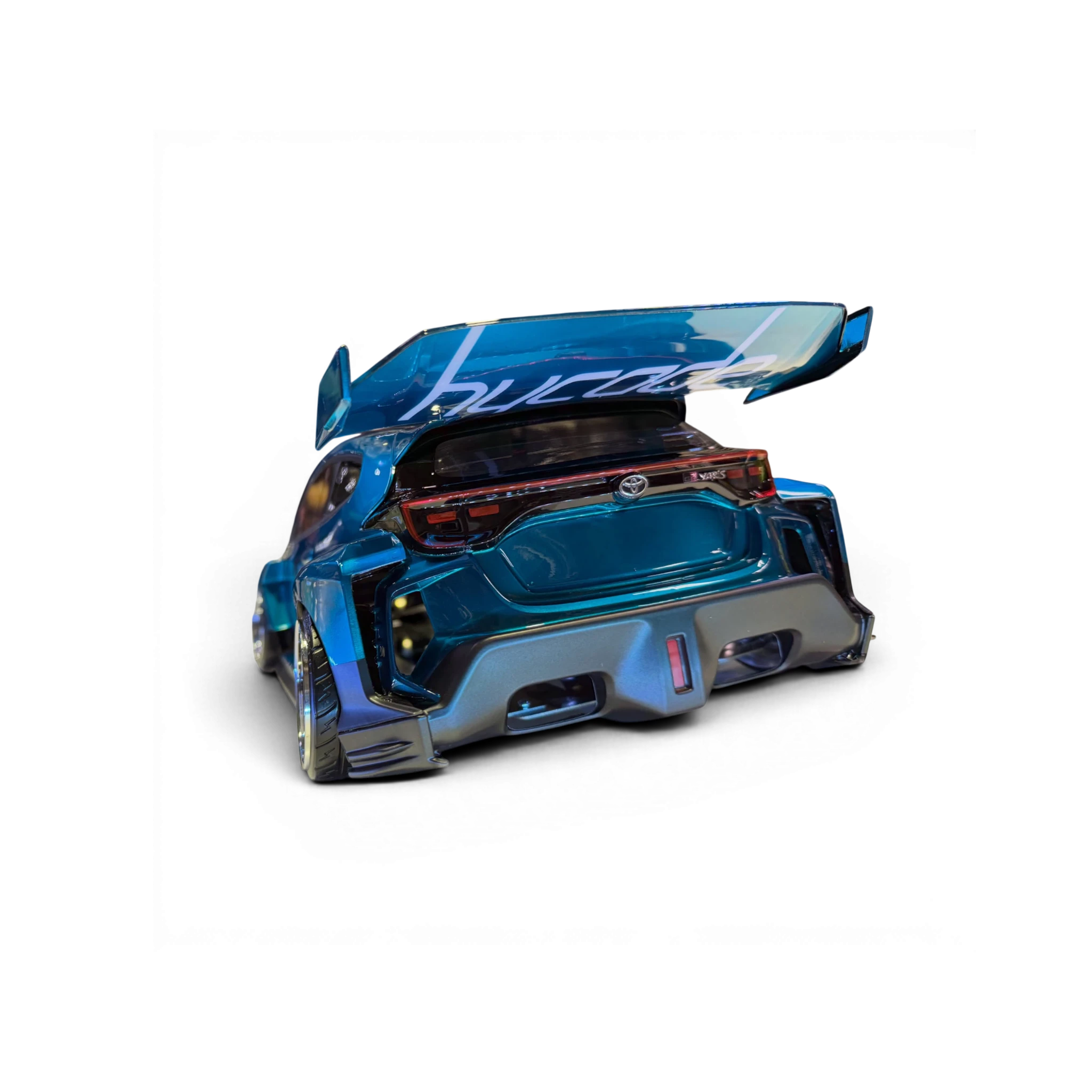 Carrosserie DriftParadiZ Addiction Toyota Yaris Hycade 1/10 bleue métallisée avec aileron arrière imposant