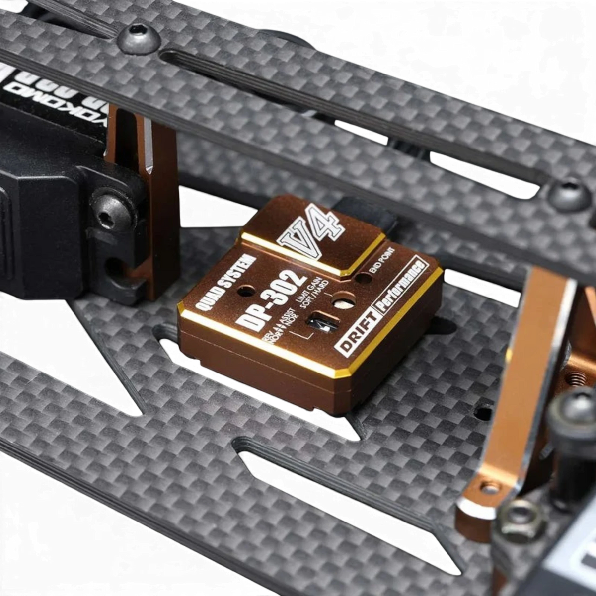 Gyro V4 Bronze de Team Yokomo, électronique 2ch/3ch, vue de face avec composants électroniques visibles.
