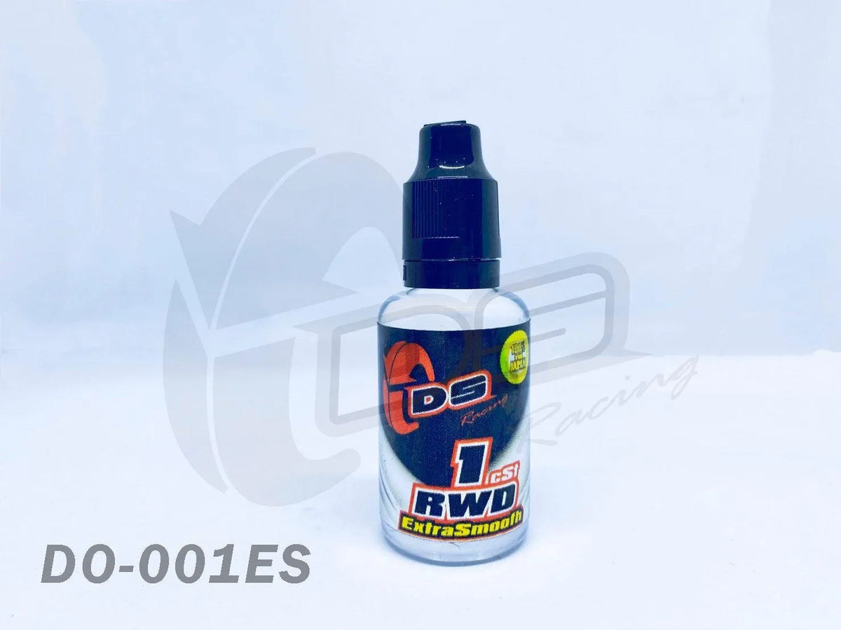 Huile amortisseur minérale 1CST SMOOTH DS Racing, accessoire pour suspension, bouteille avec étiquette bleue et logo DS Racing