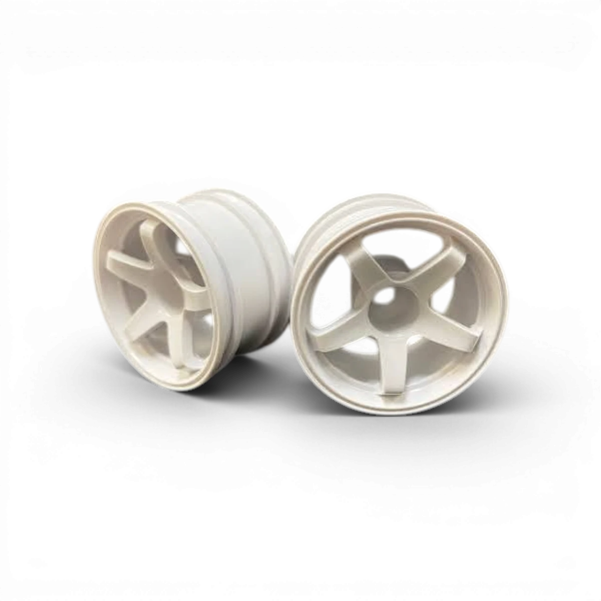 Roues Mini NModel Ver.3 Offset6 blanches de la marque Topline, vues en gros plan devant une surface claire.