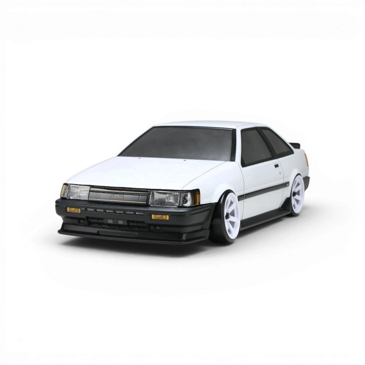 Kit de carrosserie aérodynamique pour Toyota Corolla AE86 Levin 2 portes, marque Team Yokomo, visible en détail dans l’image.