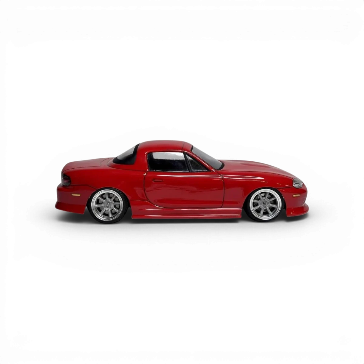 Carrosserie pour Mazda MX5 NB de la marque Aplastics RC, vue de face avec détails de la carrosserie.