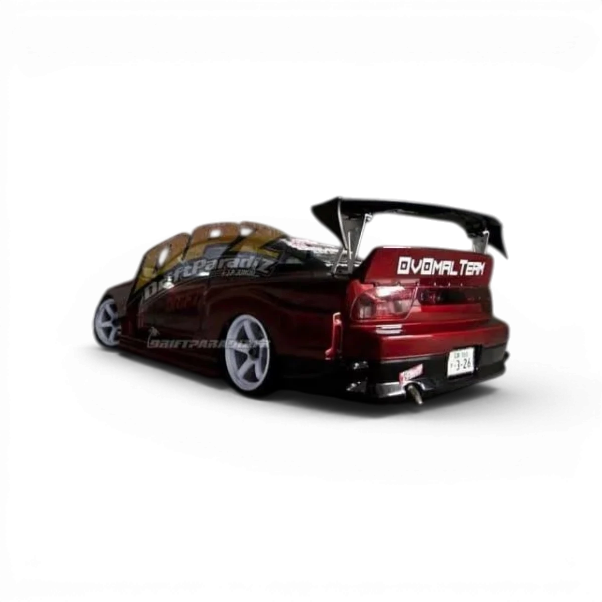 Carrosserie Nissan 180SX GP Sports pour voiture radiocommandée, fabriquée par Team Yokomo, visible en détail.