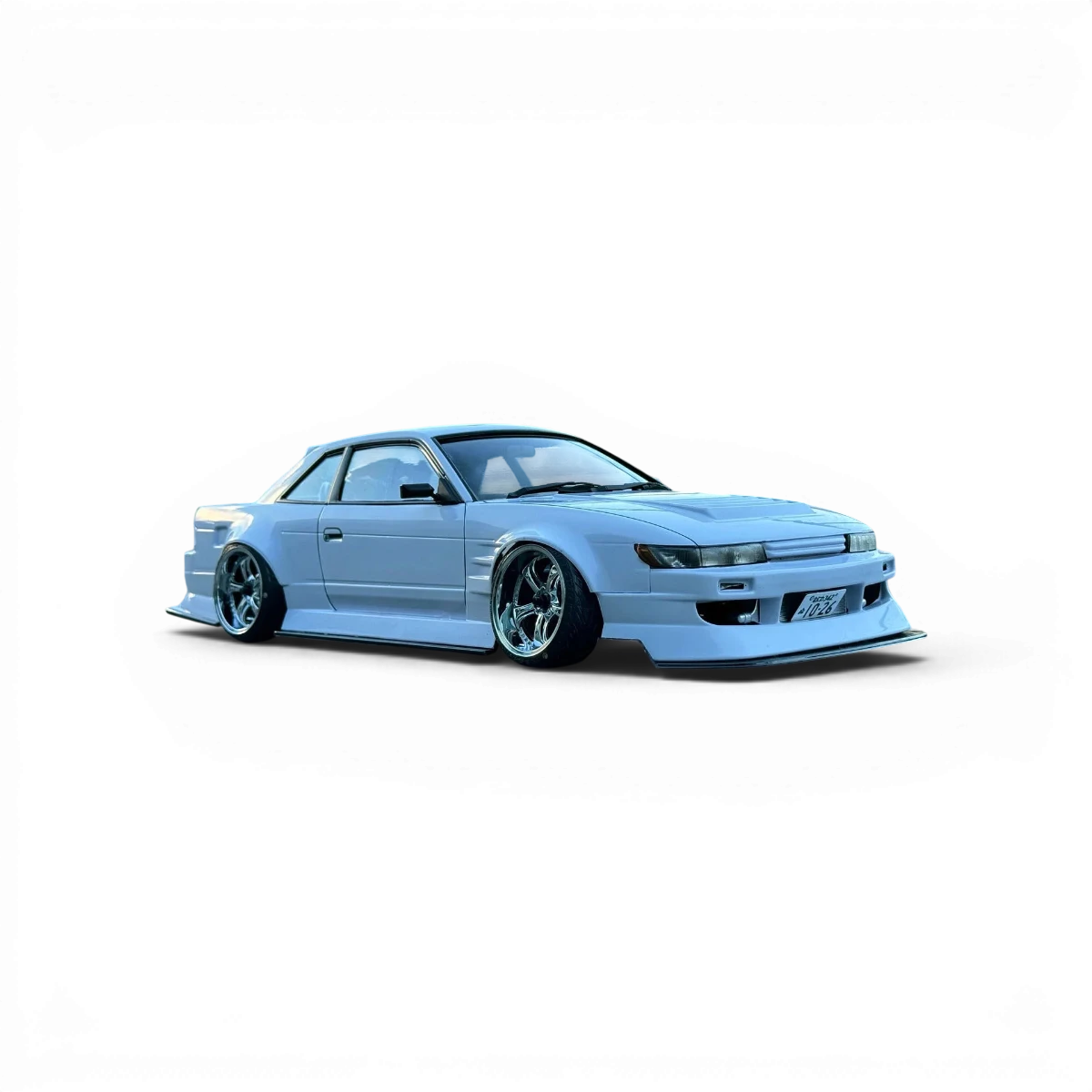Ensemble de carrosserie pour Nissan 240SX Silvia S13 NAOKI NAKAMURA 2024, version street, de Addiction RC Design, vue de face.