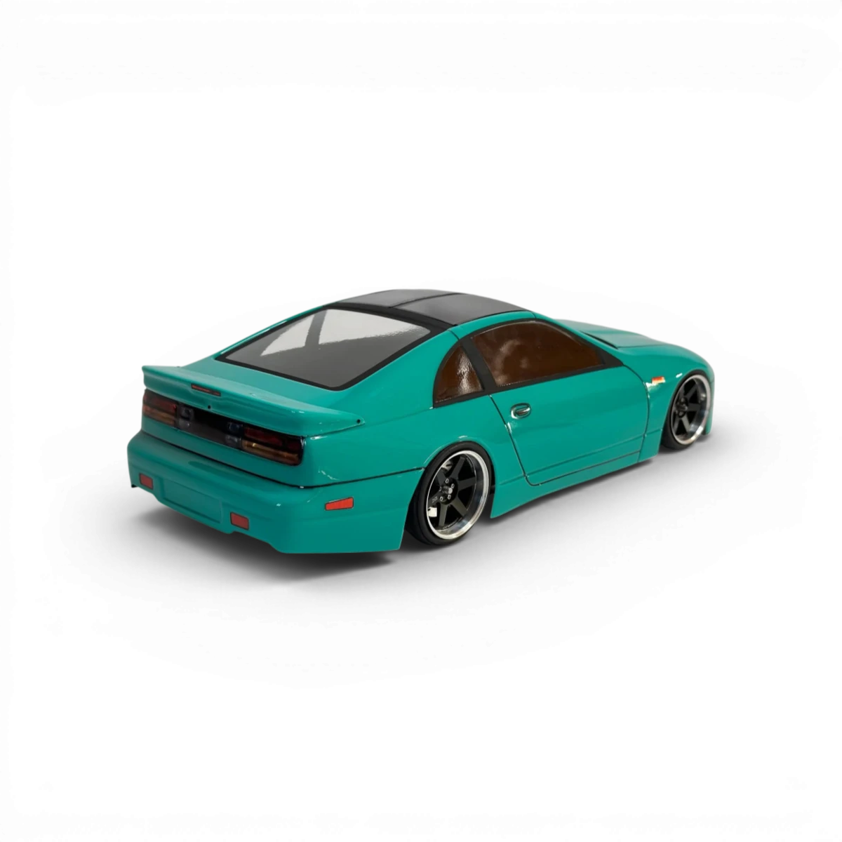 Carrosserie Nissan 300ZX Aplastics RC, finition détaillée pour modèle de voiture télécommandée, vue de face sur fond blanc