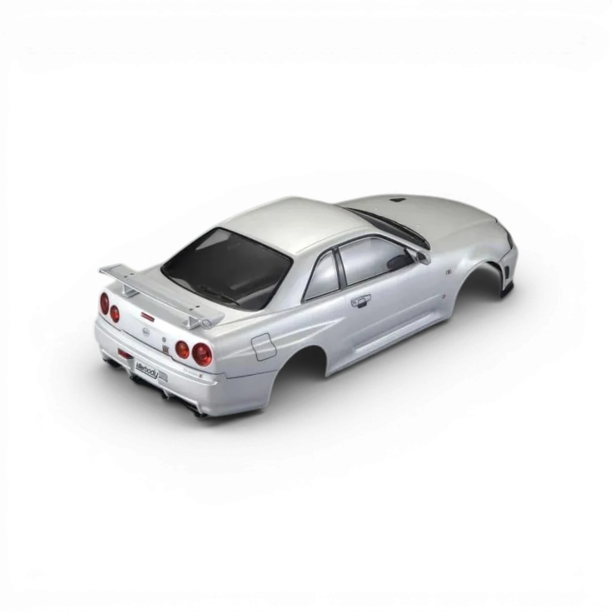 Carrosserie Nissan Skyline R34 GTR blanc perle de la marque Killer Body, vue détaillée du modèle.
