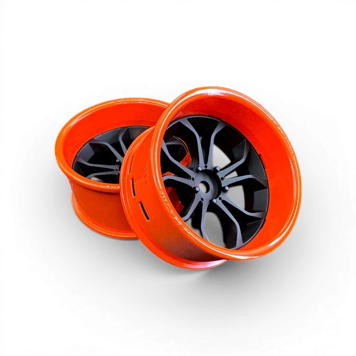 Ensemble de 2 roues Tetsujin avec cercles orange brillant et centres DeepSpider noir mat, pour vélo ou skate.