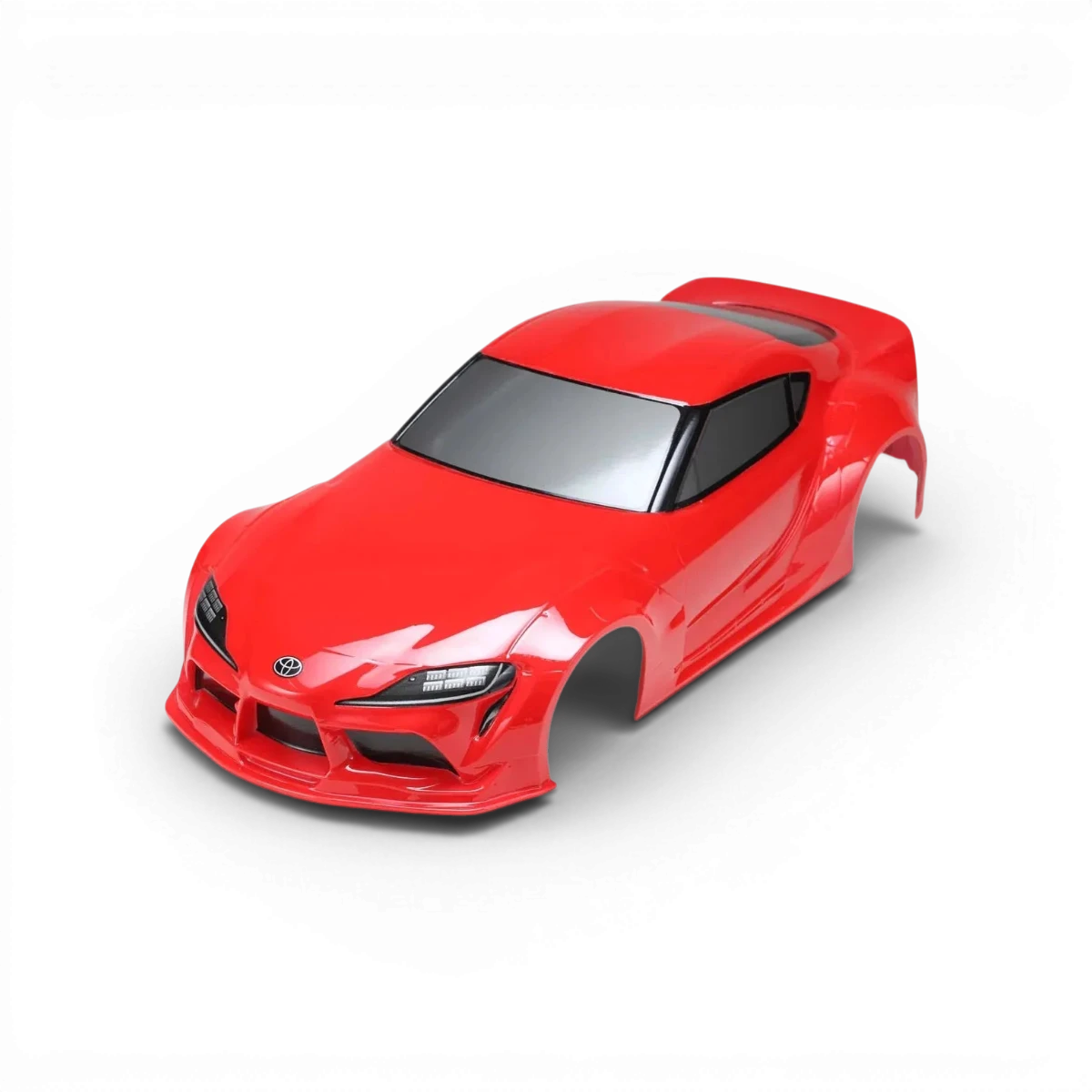 Carrosserie Toyota Supra A90 peinte en rouge, modèle pour voiture télécommandée, par Team Yokomo, vue de face sur fond blanc.