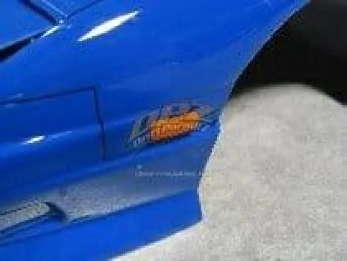 Répétiteurs latéraux orange pour personnalisation de voiture, marque D-magic JP, fixation latérale visible sur le véhicule.