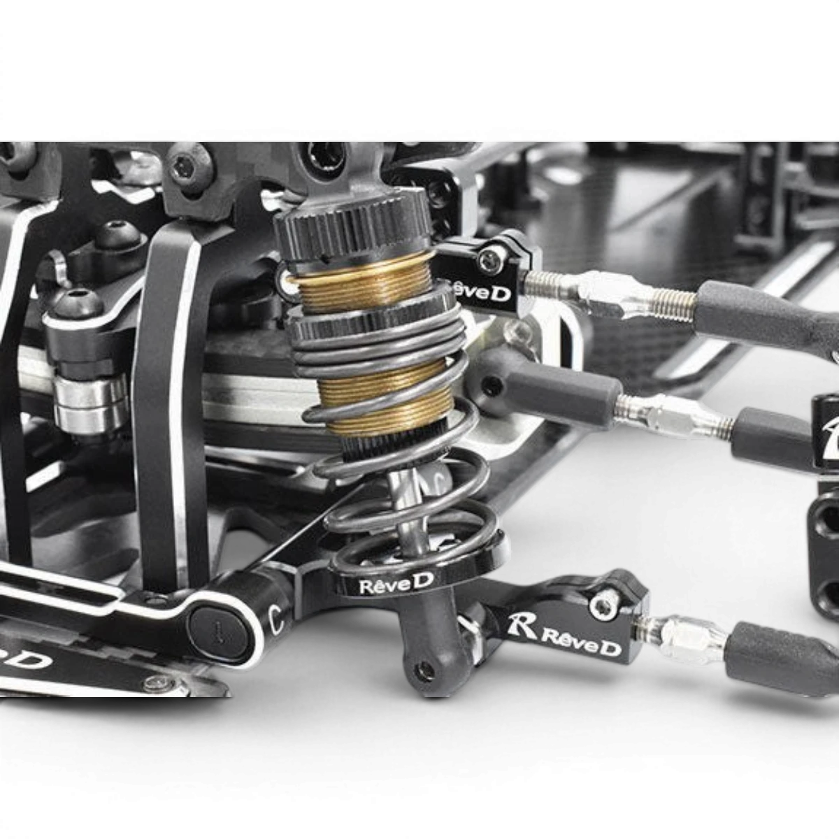 Ressorts avant R-tune soft 2 voies de Team Reve D, pièces détachées pour suspension de véhicule, visibles en image.