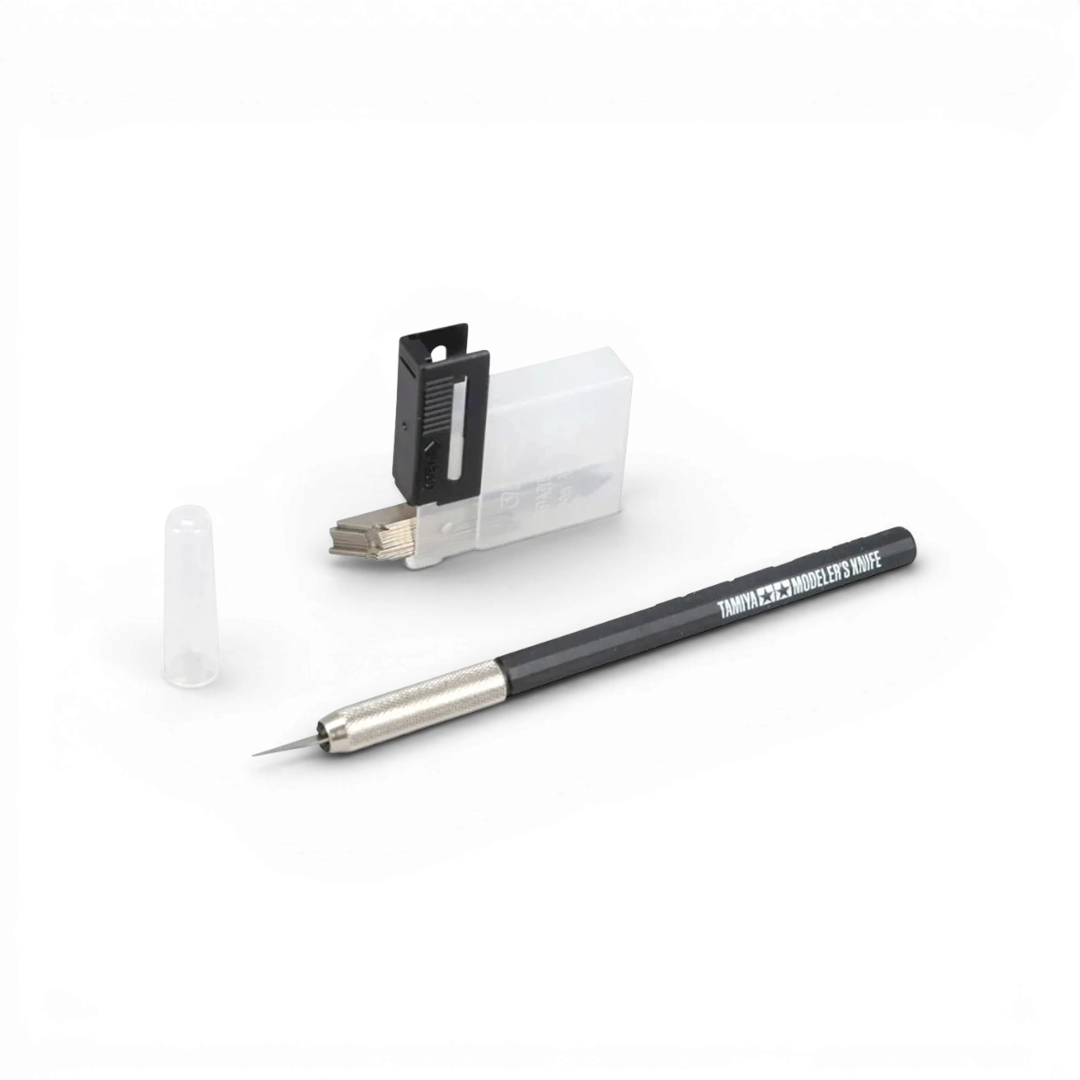 Cutter de précision noir Tamiya, accessoire pour modélisme, avec lame fine et poignée ergonomique.