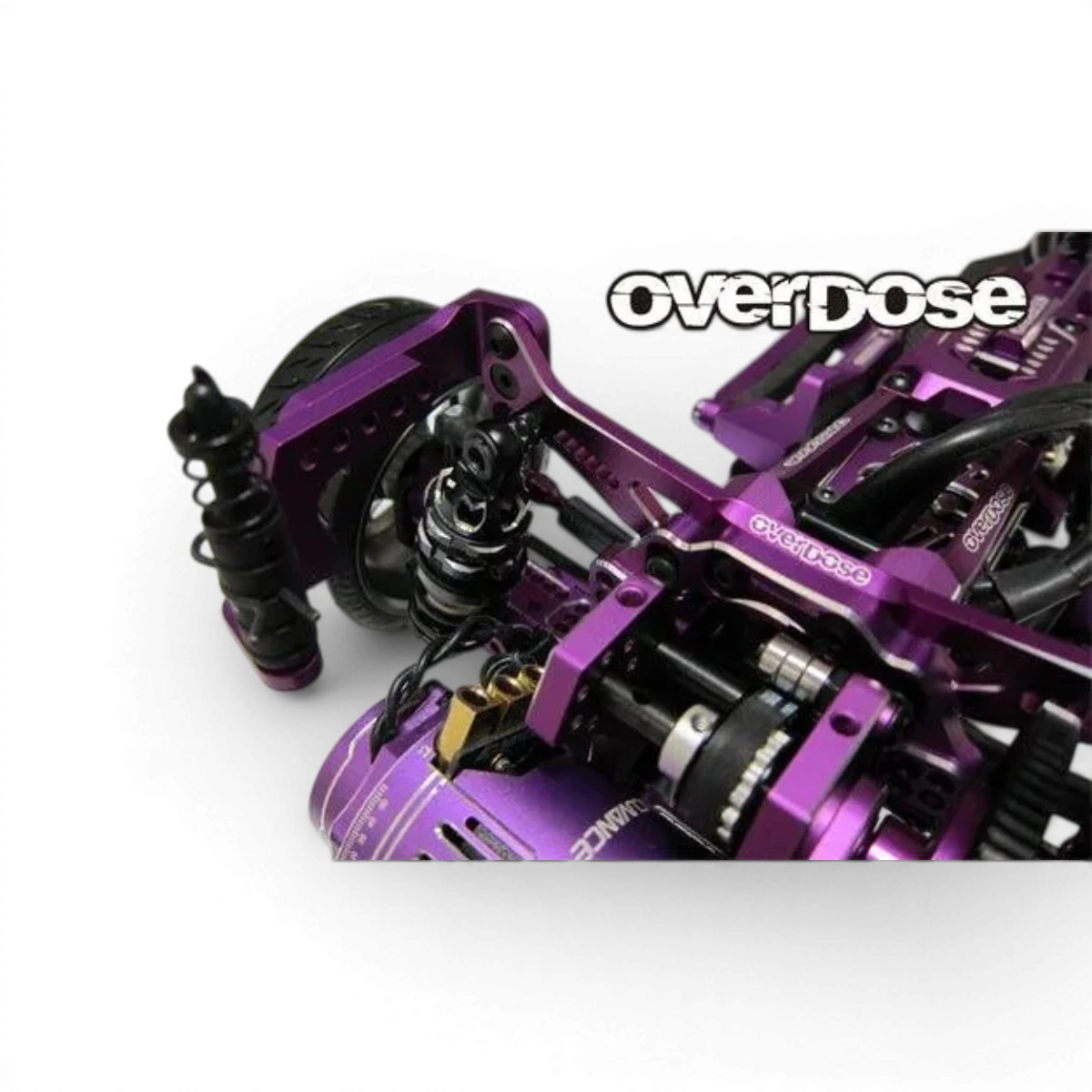 Tour amortisseur ES en aluminium violet pour pièces détachées Overdose, robuste et léger, avec détails visibles de la pièce.