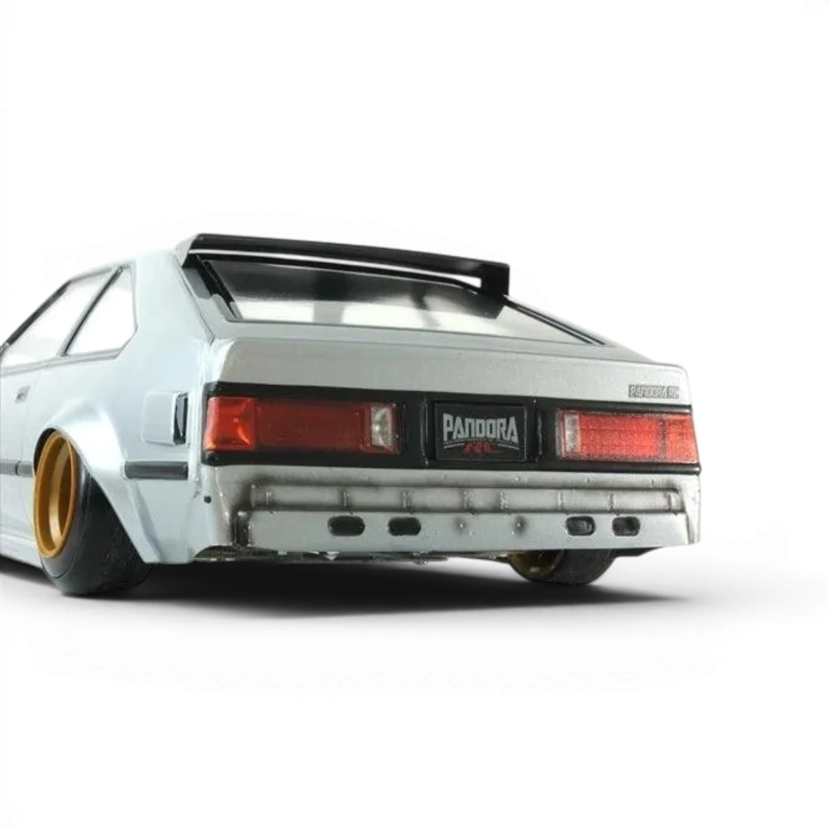 Carrosserie Toyota Celica XX (A60) de Pandora RC, imitation de voiture de course, vue en angle avec détails de la carrosserie.