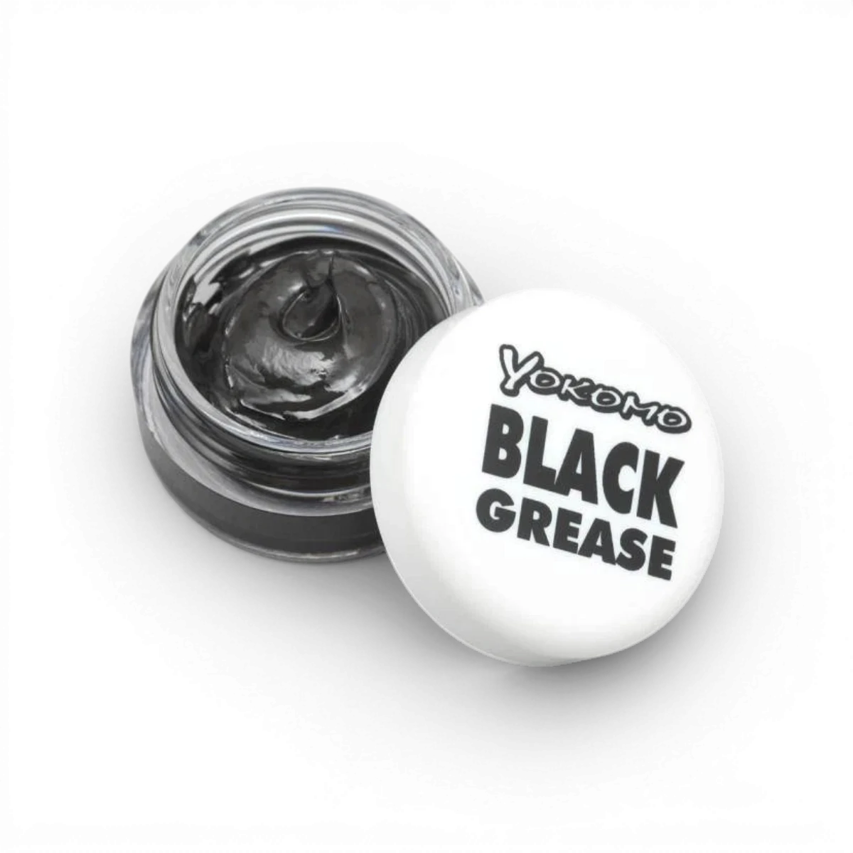 Graisse noire Team Yokomo pour accessoires de modélisme, texture épaisse et lisse visible dans le pot.